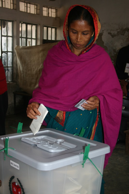 A woman casting her vote in the 2008 parliamentary elections in Bangladesh.